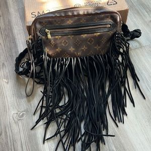 Louis Vuitton vintage boho bag. Real leather fringe and detail.